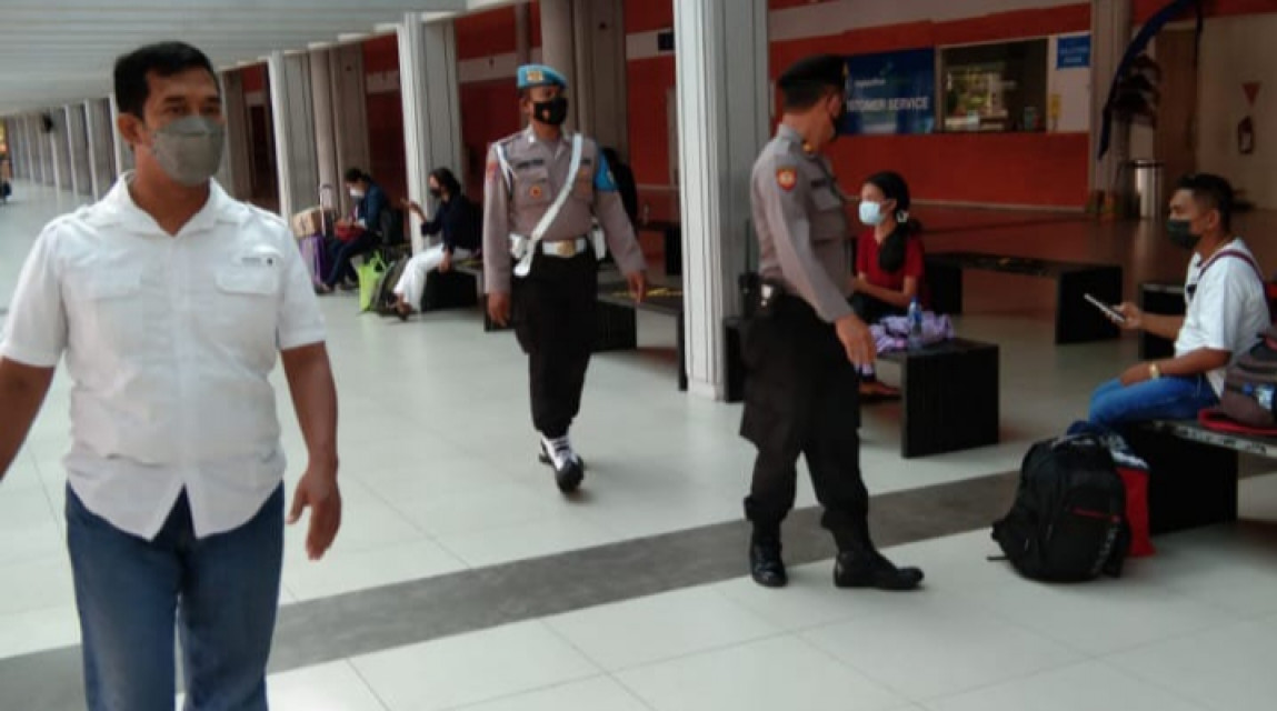 Polresta Denpasar Selalu Aktif Giat Prokes di Bandara Ngurah Rai